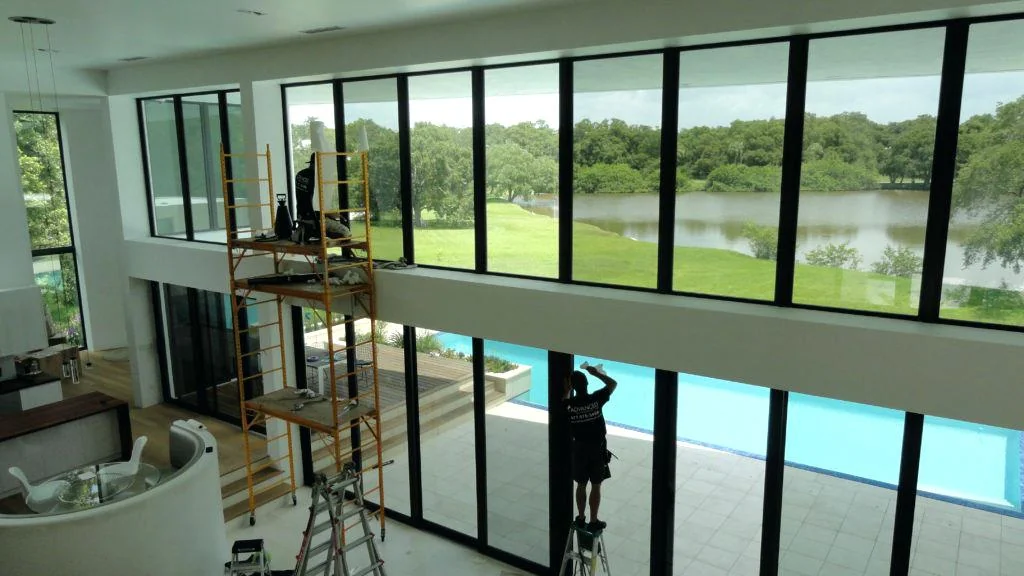Commercial interior with an expansive wall of tinted glass