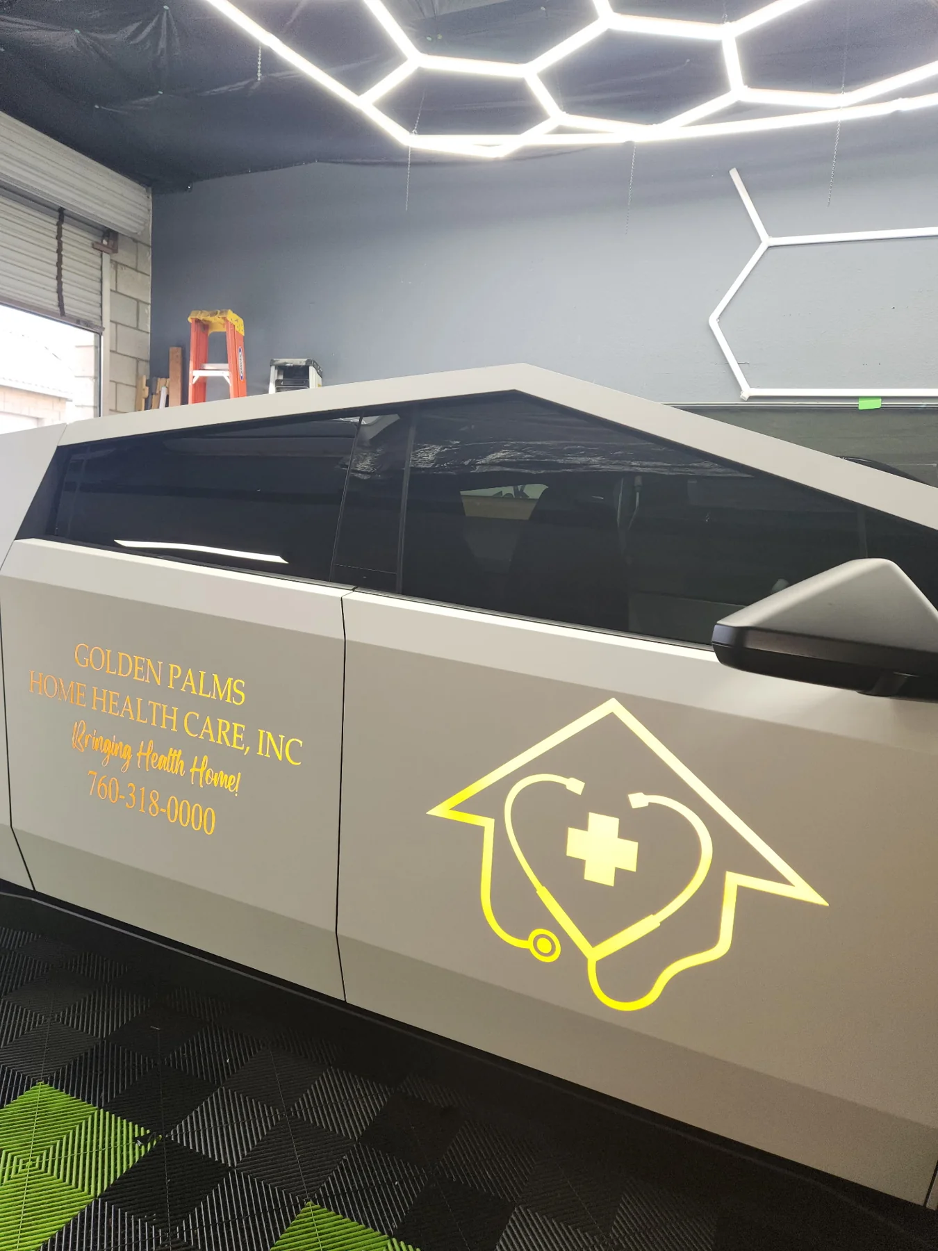 A customized Cybertruck in JC's installation shop